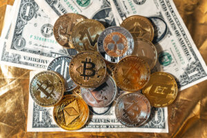 Crypto coins on gold background